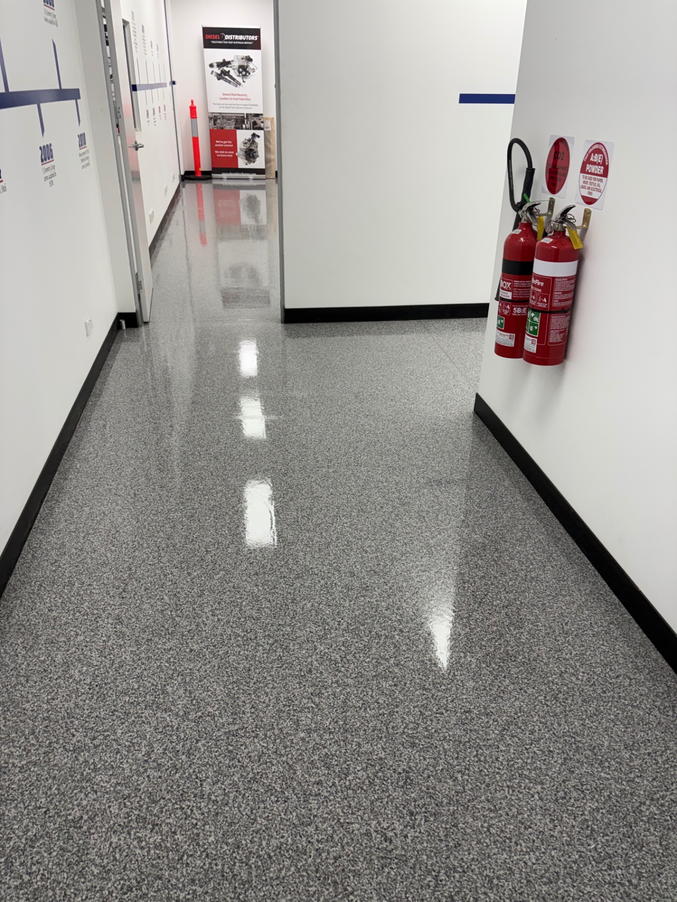 Office corridor — stripped, sealed and polished after professional office cleaning
